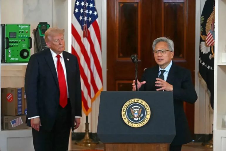 Nvidia CEO Jensen Huang (R) speaks alongside US President Donald Trump about investing in America, at the White House in Washington, DC, on April 30, 2025. (Photo by Jim WATSON / AFP) (Photo by JIM WATSON/AFP via Getty Images)