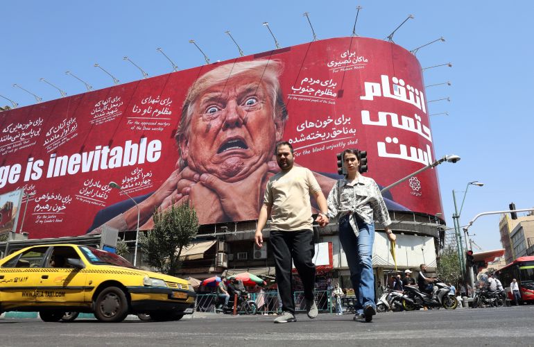 epa_6a8e6f96e2da-1787719574 epa13178255 Iranians walk near an anti-Trump billboard in Tehran, Iran, 19 August 2026. Iranian parliament speaker Mohammad Bagher Ghalibaf said that the Strait of Hormuz will remain closed until the United States lifts its blockade and ends sanctions. EPA/ABEDIN TAHERKENAREH RESTRICTIONS: NO Access Israel Media/Persian Language TV Stations Outside Iran/Strictly No Access BBC Persian/VOA Persian/Manoto TV/Iran International TV. (As mandated by Iran's Directorate General for Foreign Media) --