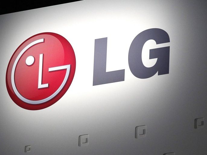 f15904cc-76f0-4a04-9726-566273af5116 LG Electronics' company logo is displayed at their news conference at the Consumer Electronics Show (CES) in Las Vegas January 7, 2013. LG Electronics will begin selling televisions based on "OLED" technology, which allows for thinner displays that consume less power, in the United States in March. REUTERS/Rick Wilking (UNITED STATES - Tags: BUSINESS SCIENCE TECHNOLOGY LOGO)