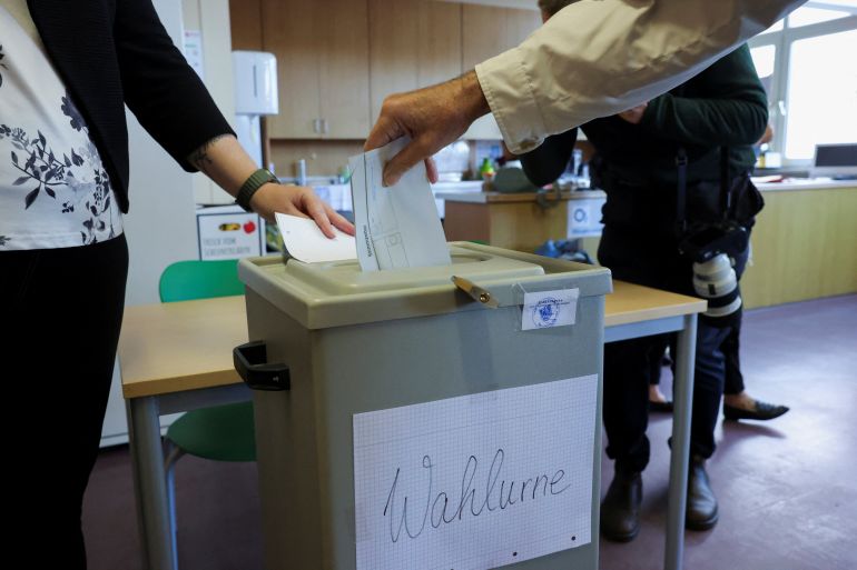 germanu-4-1788700332 A voter casts his vote in the Saxony-Anhalt state election, in Tangermuende, Germany, September 6, 2026. REUTERS/Fabrizio Bensch