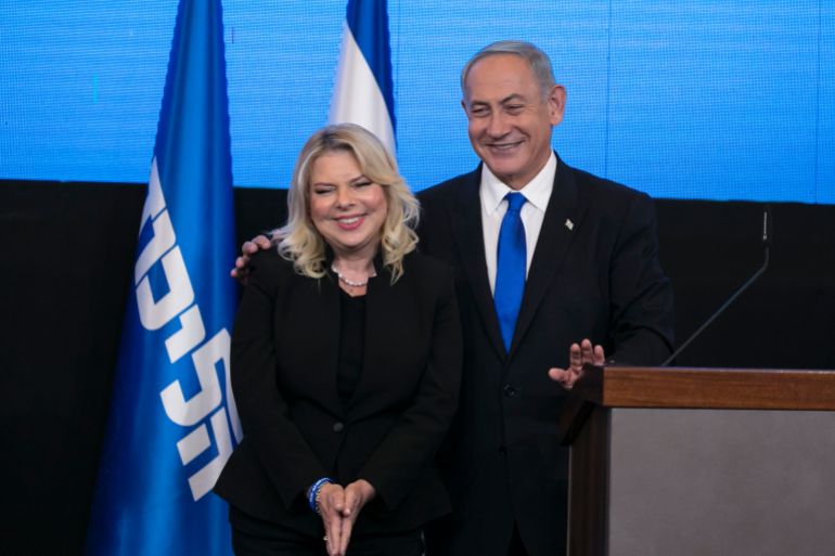 JERUSALEM, ISRAEL - NOVEMBER 01: Former Israeli Prime Minister Benjamin Netanyahu and his wife Sara Netanyahu greet supporters at an election-night event on November 1, 2022 in Jerusalem, Israel. Exit polls showed Netanyahu holding a narrow lead late on Election Day, the country's fifth in four years that will name a new Kesset, the 120-seat parliament. (Photo by Amir Levy/Getty Images)