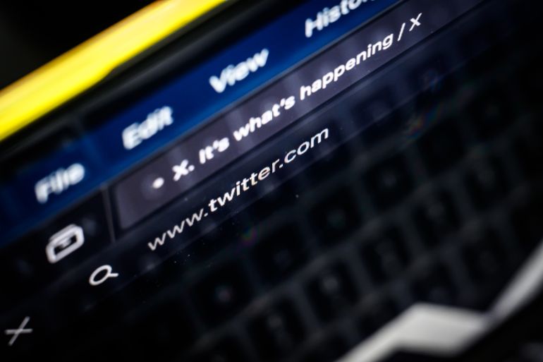 LONDON, ENGLAND - MAY 17: In this photo illustration, a web browser displays the URL www.twitter.com while displaying X.com, on May 17, 2024 in London, England. Today, the social media platform formerly known as Twitter transitioned to X.com URLs. Elon Musk acquired Twitter in 2022 and promptly rebranded the company as X. (Photo by Leon Neal/Getty Images)