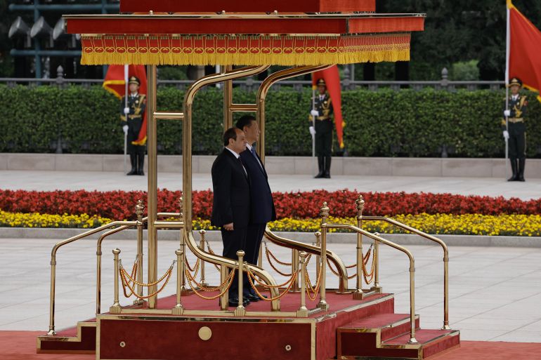getty_6a96b03905-1788260409 BEIJING, CHINA - MAY 29: Chinese President Xi Jinping stands next to Egyptian President Abdel Fattah al-Sisi (L) during a welcome ceremony at the Great Hall of the People on May 29, 2024 in Beijing, China. (Photo by Tingshu Wang-Pool/Getty Images)