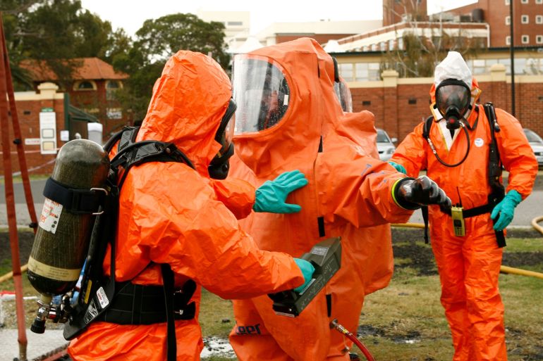 getty_6aa42e34a6-1789144628 MELBOURNE, AUSTRALIA - FEBRUARY 13: Emergency crews are decontaminated as police in the Australian state of Victoria conduct a chemical, biological, radiological (CBR) hostage exercise at Caulfield Racecourse February 13, 2007 in Melbourne, Australia. The training exercise is part of a program for emergency service providers to practice and update their skills in different scenarios. Police along with members of the Metropolitan Fire Brigade, Country Fire Authority and the Metropolitan Ambulance Service took part in the exercise. (Photo by Simon Fergusson/Getty Images)