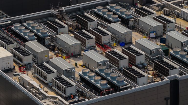 getty_6aafb8df07-1789901023 SLOUGH, ENGLAND - AUGUST 26: The roof of an Equinix data centre is pictured on August 26, 2026 in Slough, England. The agglomeration of data centres just west of the British capital is the largest data centre hub in Europe and second largest in the world, after Virginia in the United States. (Photo by Carl Court/Getty Images)