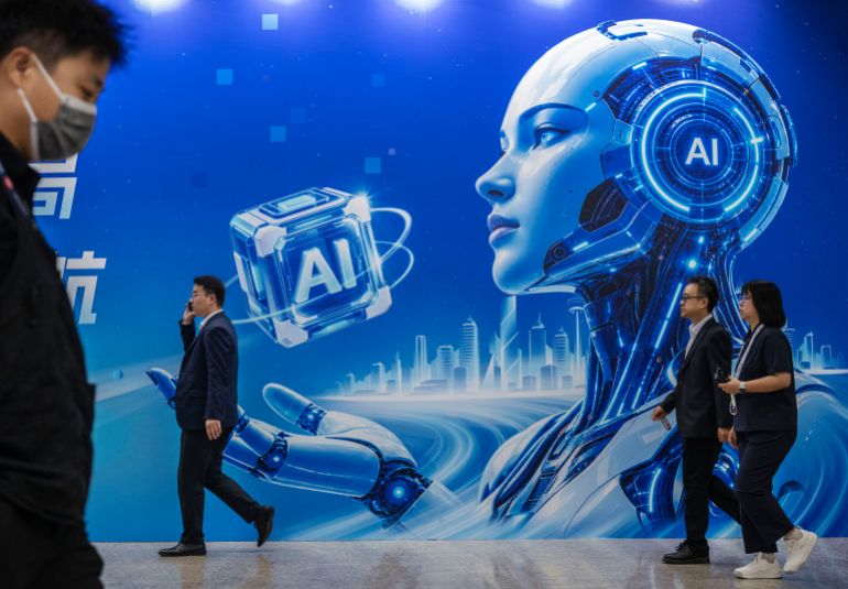 getty_6ab8fd70b2-1790508400-1 BEIJING, CHINA - SEPTEMBER 22: Visitors walk by a billboard for AI as they attend the PT Expo on September 22, 2026 in Beijing, China. When U.S. President Donald Trump and Chinese President Xi Jinping meet later this week in Washington, artificial intelligence is expected to be high on the agenda. (Photo by Kevin Frayer/Getty Images)