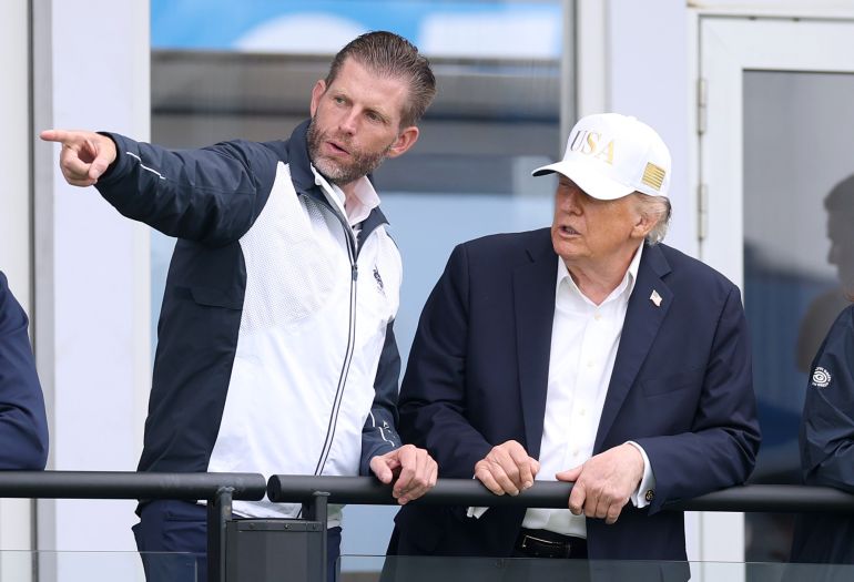 getty_6ab9ffe151-1790574561 DOONBEG, IRELAND - SEPTEMBER 12: U.S. President Donald Trump speaks with his son Eric Trump on day three of the Amgen Irish Open at Trump International Golf Links in Doonbeg on September 12, 2026 in Doonbeg, Ireland. (Photo by Warren Little/Getty Images)
