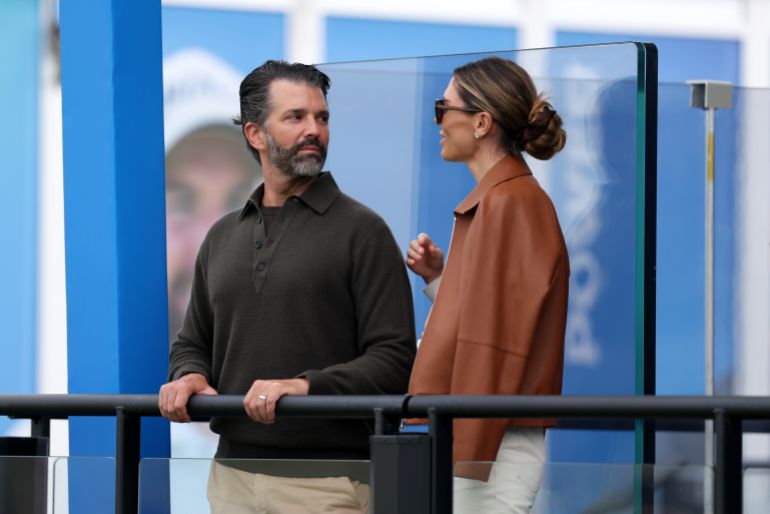 getty_6aba008b8d-1790574731 DOONBEG, IRELAND - SEPTEMBER 13: Donald Trump Jr. talks with his wife Bettina Anderson on day four of the Amgen Irish Open at Trump International Golf Links in Doonbeg on September 13, 2026 in Doonbeg, Ireland. (Photo by Richard Heathcote/Getty Images)