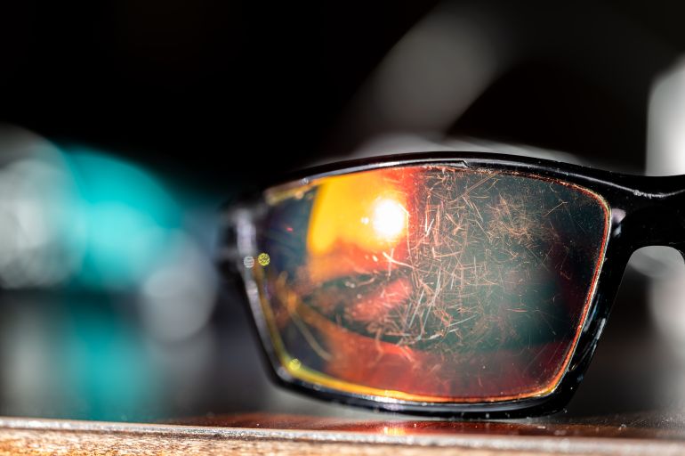 gettyimages-1453502889-1789926230 macro of the scratched surface of a polarized sunglasses lens. High quality photo