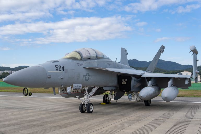 gettyimages-2241169474-1767895842 A Boeing EA-18G Growler is displayed during the Seoul International Aerospace and Defense Exhibition (ADEX 2025) at Seoul Air Base in Seongnam, Gyeonggi Province, South Korea, on October 17, 2025. The eight-day event, held through October 24 at both Seoul Air Base and KINTEX in Ilsan, features more than 600 companies from 35 countries presenting the latest aerospace and defense technologies. (Photo by Chris Jung/NurPhoto via Getty Images)
