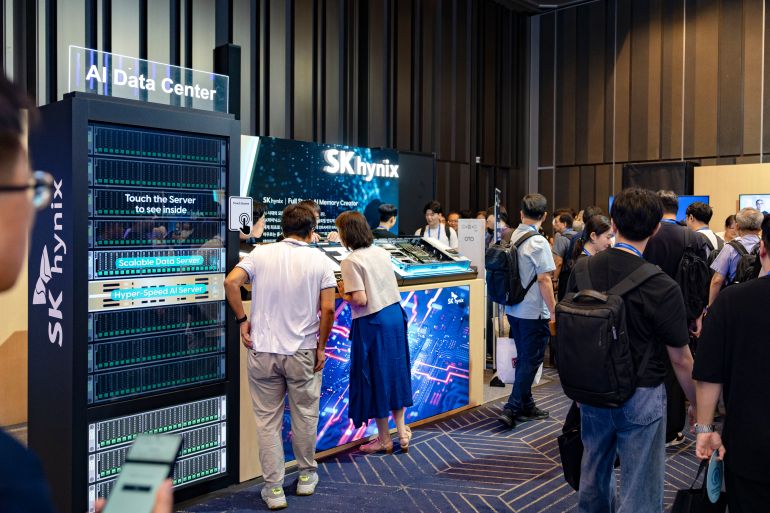 gettyimages-2291482397-1789197682 Visitors gather around the SK Hynix exhibition stand presenting 'Full Stack AI Memory Creator' solutions and advanced memory modules during the Dell Technologies Forum 2026 at COEX in Seoul, South Korea, on August 25, 2026. (Photo by Chris Jung/NurPhoto via Getty Images)