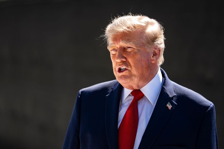 gettyimages-2293376228-1789051472 WASHINGTON, DC - AUGUST 19: US President Donald Trump speaks to members of the media while touring construction of the new White House helipad and driveway on the South Lawn of the White House on Aug. 19, 2026 in Washington, DC. (Photo by Al Drago/Getty Images)