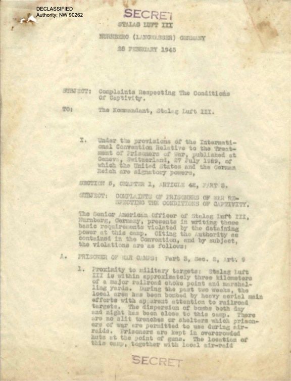image032-1789288554 ****داخلية***The first document Hurdle saw had a report from Army Air Forces Col. Darr H. Alkire, who was shot down and captured by German forces. In the document labeled “SECRET,” dated Feb. 28, 1945, Alkire wrote that a German prison camp had violated an agreement among world powers on the treatment of prisoners of war. He detailed supply shortages, cramped conditions and a dangerous proximity to military targets. (National Archives and Records Administration)