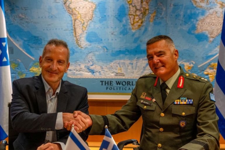 reutees-1788205156 Director General of the Israel Ministry of Defense (IMOD), Maj. Gen. (Res.) Amir Baram, and his Greek counterpart, Ioannis Bouras, shake hands as they signed an approximately €3 billion defense export agreement in a ceremony at the IMOD's headquarters in Tel Aviv in this handout image obtained by Reuters on August 31, 2026. Israel Defence Ministry/Handout via REUTERS THIS IMAGE HAS BEEN SUPPLIED BY A THIRD PARTY. MANDATORY CREDIT. BEST QUALITY AVAILABLE.