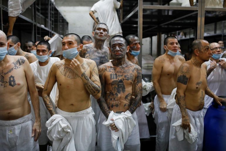 Inmates stand during a media tour at the Terrorism Confinement Center (CECOT) prison, in Tecoluca, El Salvador April 4, 2025. REUTERS/Jose Cabezas