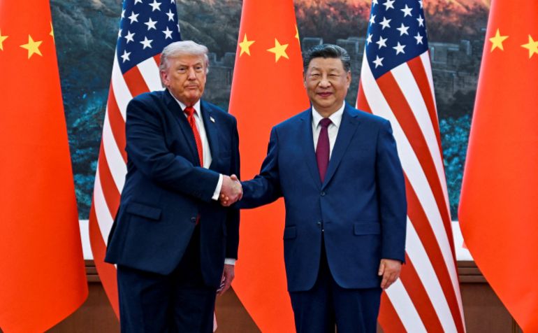 FILE PHOTO: The scene as U.S. President Donald Trump participates in events at the Great Hall of the People and does a greeting with the President of the People’s Republic of China Xi Jinping May 14, 2026, in Beijing China during a trip focused on trade, regional security, and strengthening bilateral ties between the world’s two largest economies. Kenny Holston/Pool via REUTERS/File Photo