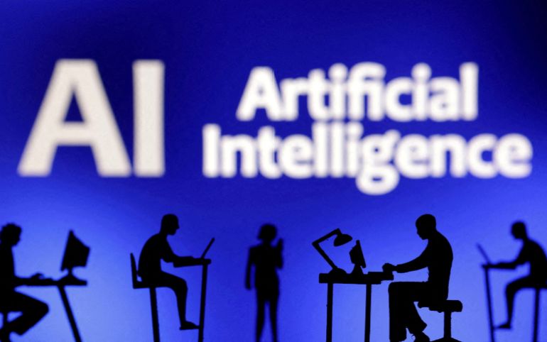 reuters_6a43bee4-1782824676-1 FILE PHOTO: Figurines with computers and smartphones are seen in front of the words "Artificial Intelligence AI" in this illustration taken, February 19, 2024. REUTERS/Dado Ruvic/Illustration/File Photo