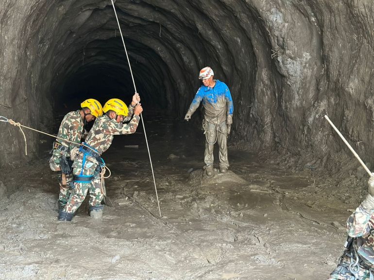 reuters_6a97d9cf-1788336591 Nepal army soldiers work during a search and rescue operation outside a tunnel near the Hydropower Project sites, following deadly flash floods and mudslides, in Rasuwa district, Nepal, in this handout obtained by Reuters on September 2, 2026. Nepal Army/Handout via REUTERS THIS IMAGE HAS BEEN SUPPLIED BY A THIRD PARTY. MANDATORY CREDIT. NO RESALES. NO ARCHIVES.