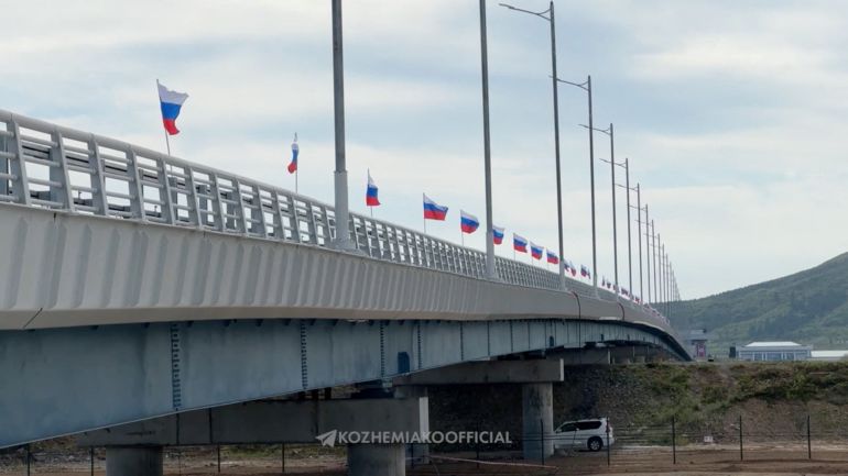 Flags fly during a ceremony opening the first road bridge between Russia and North Korea across the Tumen River, locally known as Tumannaya, on the border with North Korea in the Primorsky region, Russia, September 7, 2026, in this still image taken from a video. Governor of the Primorsky region Oleg Kozhemyako Telegram Channel/Handout via REUTERS ATTENTION EDITORS - THIS IMAGE WAS PROVIDED BY A THIRD PARTY. NO RESALES. NO ARCHIVES. MANDATORY CREDIT. OVERLAY FROM SOURCE.