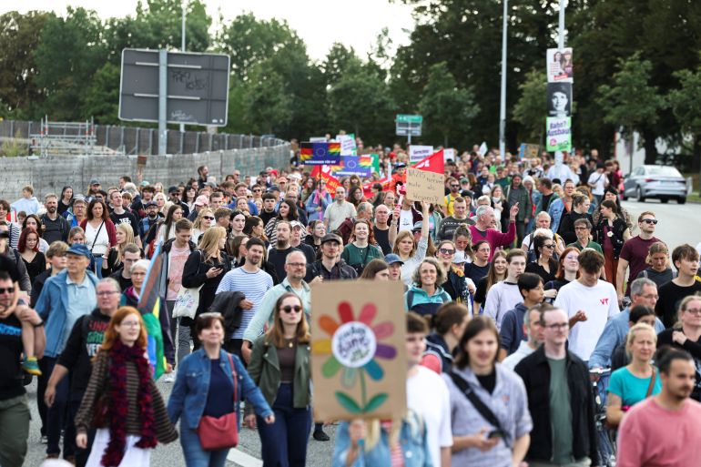 Demonstrators take part in a protest against the far-right Alternative for Germany (AfD), and for an open, supportive and democratic society, ahead of the Mecklenburg-Western Pomerania state elections in Rostock, Germany, September 12, 2026. REUTERS/Christian Mang