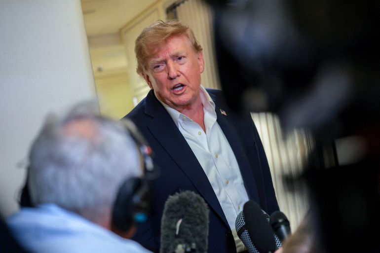 U.S. President Donald Trump speaks to members of the media aboard Air Force One, en route to Joint Base Andrews, Maryland, U.S., following a two-day visit to Ireland, September 13, 2026. REUTERS/Kylie Cooper