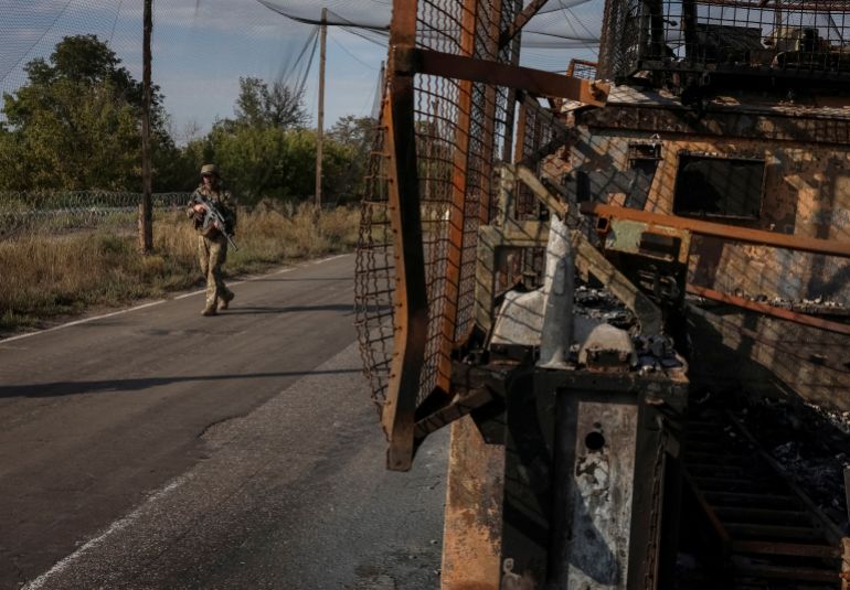 reuters_6aa889d4-1789430228 A serviceman of the Alcatraz Battalion of the 93rd Kholodnyi Yar Separate Mechanized Brigade of the Ukrainian Armed Forces patrols a road, amid Russia's attack on Ukraine, near the frontline city of Kramatorsk, Ukraine September 11, 2026. REUTERS/Anatolii Stepanov