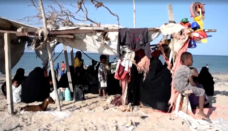 Refugees from Yemen, fleeing clashes between Houthi fighters and Saudi-backed Yemeni government forces, gather under a shade after arriving in Djibouti, September 12, 2026, in this screen grab taken from a video. International Organization for Migration/Handout via REUTERS ATTENTION EDITORS - THIS IMAGE HAS BEEN SUPPLIED BY A THIRD PARTY. NO RESALES. NO ARCHIVES