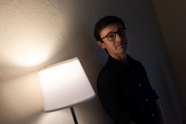 reuters_6ab266a4-1790076580 Anthropic's former employee Joe Benton poses for a portrait at his apartment in Berkeley, California, U.S., September 14, 2026. REUTERS/Carlos Barria