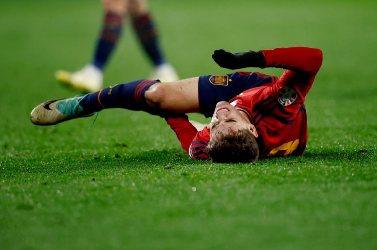 Soccer Football - Euro 2024 Qualifier - Group A - Spain v Georgia - Estadio Jose Zorrilla, Valladolid, Spain - November 19, 2023 Spain's Gavi reacts after sustaining an injury REUTERS/Juan Medina