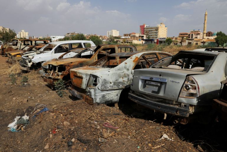 Cars with bullet holes on them in a square in Khartoum, Sudan, June 11, 2026. Authorities in Khartoum are collecting thousands of abandoned, damaged and suspected stolen vehicles from streets and public squares. REUTERS/El Tayeb Siddig
