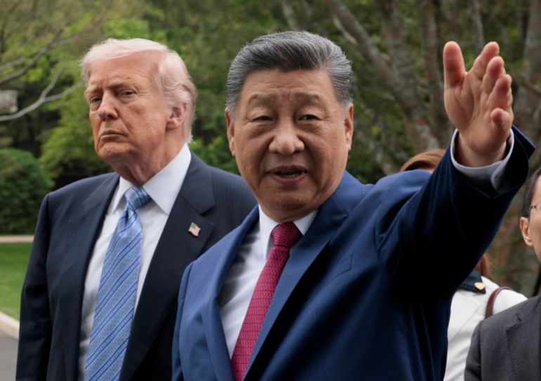 xi-5trump-1785589280 Chinese President Xi Jinping gestures as he greets U.S. President Donald Trump at Zhongnanhai Garden in Beijing, China, May 15, 2026. REUTERS/Evan Vucci/Pool