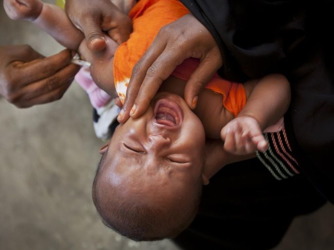 06169dc8-3e2d-4d07-83bf-e59bf0f898df A Somali baby cries while receiving a five-in-one vaccine against several potentially fatal childhood diseases, at the Medina Maternal Child Health center in Mogadishu, Somalia Wednesday, April 24, 2013. On the eve of the Global Vaccine Summit in Abu Dhabi and coinciding with World Immunization Week, the authorities in Somalia, which has one of the lowest immunization rates in the world, launched the new deployment of a pentavalent vaccine against diphtheria, tetanus, whooping cough, hepatitis B, and haemophilus influenzae type B the bacteria that causes meningitis and pneumonia. (AP Photo/Ben Curtis)