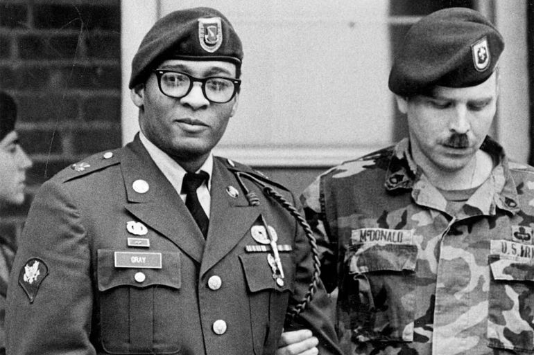1-1791437197 Ronald Gray leaves a courtroom escorted by military police at Fort Bragg, North Carolina, on April 6, 1988.Marcus Castro / AP file