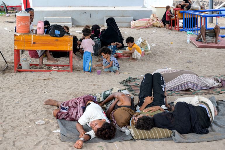 22-1791451768-2 Internally displaced people (IDPs) lay on the ground at a temporary shelter at the Shawkani school, north of Aden in southern Yemen, on September 15, 2026. The fighting in Yemen in recent weeks has displaced nearly 86,000 people, a UN agency said on September 13, with the number surging by 10,000 from a day earlier. (Photo by AFP) /