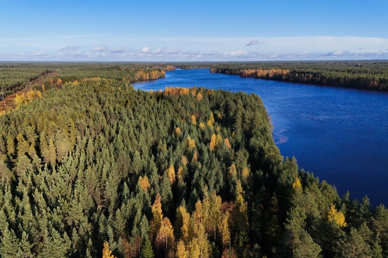 2468s34y1s-1791180298 An aerial view shows the site where Google's new data centre is planned to be built in Vaala, Finland, on September 29, 2026. In the northern Finnish town of Muhos, 36-year-old farmer Joni Pitkanen is preparing for life with a new neighbour -- just kilometers away tech giant Google is planning to build new data centres. The planned data centres are part of an announced 13-billion-euro ($15-billion) investment in Finland over the next two years -- the US tech giant's single biggest investment in Europe. A few kilometers down the gravel road that passes by Pitkanen's farm, the forest has already been cut down on land acquired by Google, with excavators now clearing the ground and rumbling trucks shuttling back and forth to the construction area located next to major power lines. (Photo by Alessandro RAMPAZZO / AFP)