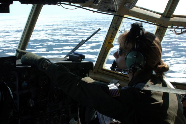 346a84sd6a8s34da-1791284601 AT SEA (April 13, 2006)--Coast Guard Lt. Jody Popp points out icebergs while taking part in the International Ice Patrol. The International Ice Patrol was founded after the RMS Titanic struck an iceberg and sank April 15, 1912, killing 1,517 people. USCG photo by PA3 Kip Wadlow credit : Photo by Petty Officer 3rd Class Kip Wadlow
