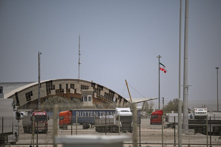 46s84ys68y-1791118583 This photo shows a general view of the passenger hall on the Iranian side of the Shalamjah (Shalamcheh) border crossing as seen from the Iraqi side in Basra province On July 23, 2026 hours after the crossing was targeted by a US airstrike. Iranian Shiite Muslim pilgrims use this border crossing to enter into Iraq to take part in the commemorations for Arbaeen. Each year, pilgrims converge in large numbers to the holy Iraqi cities of Najaf and Karbala ahead of Arbaeen, which marks the 40th day after Ashura, commemorating the seventh century killing of Prophet Mohammed's grandson Imam Hussein. (Photo by Hussein FALEH / AFP)
