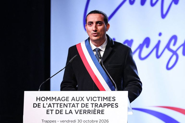 5465465-4-1793429846 Trappes' mayor Ali Rabeh speaks during a rally against racism and to pay tribute to the victims of the racist attack that took place in the Yvelines region, in Trappes on October 30, 2026. A man arrested after a gun attack, which took place on October 23, 2026 in the towns of Trappes and La Verriere, west of Paris, killing one person and wounding seven including a child, has admitted to "targeting individuals who appeared to be Muslim, African, or North African," prosecutors said on October 29, 2026. (Photo by SIMON WOHLFAHRT / AFP via Getty Images)