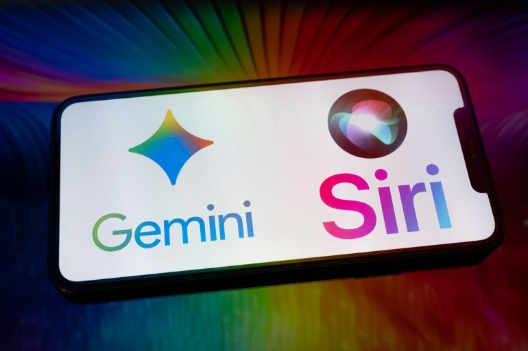The Gemini and Siri logos appear on the screen of a smartphone placed on a surface reflecting an abstract illustration in Google colors. Google and Apple enter into a collaboration agreement to integrate Gemini into Siri and the entire ecosystem in Creteil, France, on January 14, 2026. (Photo by Samuel Boivin/NurPhoto via Getty Images)