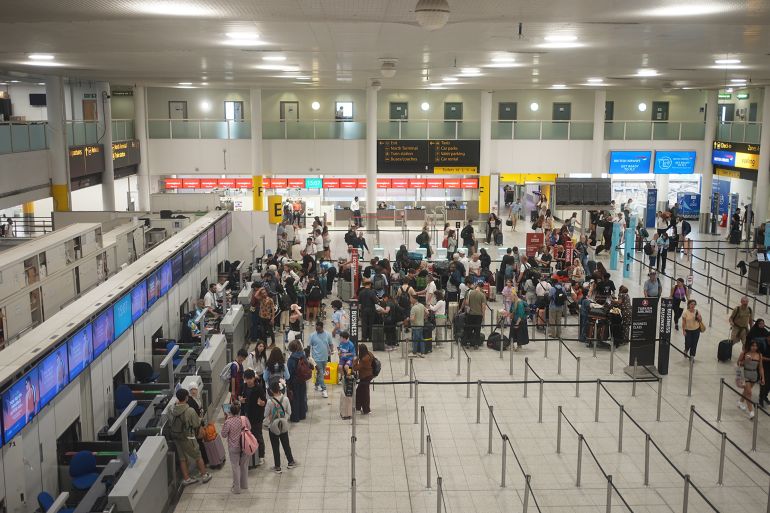 6767778-1792091536 Check-in lines at the South terminal of Gatwick airport in Crawley, West Sussex, where passengers have no access to working toilets or bars and restaurants because of a water supply failure. Although flights are unaffected, several services have been compromised at both of the Sussex airport's terminals, with passengers posting online that they are unable to get hot drinks, wash their hands or fill up water bottles. Picture date: Sunday July 26, 2026. (Photo by Aaron Chown/PA Images via Getty Images)