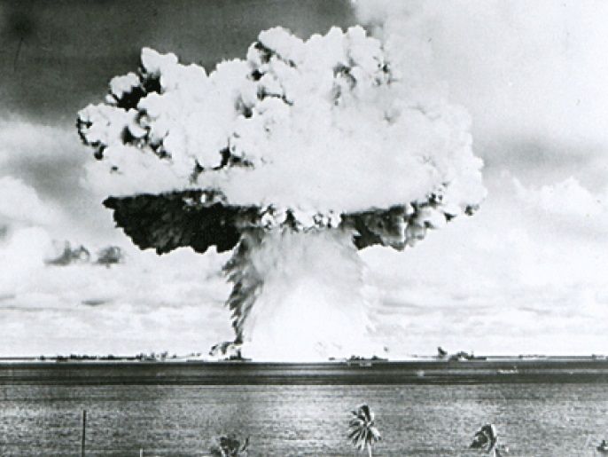 8093fb69-88e6-407c-9ca3-cd96710e053c This U.S. Navy handout image shows Baker, the second of the two atomic bomb tests, in which a 63-kiloton warhead was exploded 90 feet under water as part of Operation Crossroads, conducted at Bikini Atoll in July 1946 to measure nuclear weapon effects on warships. The United States said on April 25, 2014, it was examining lawsuits filed by the Marshall Islands against it and eight other nuclear-armed countries that accuse them of failing in their obligation to negotiate