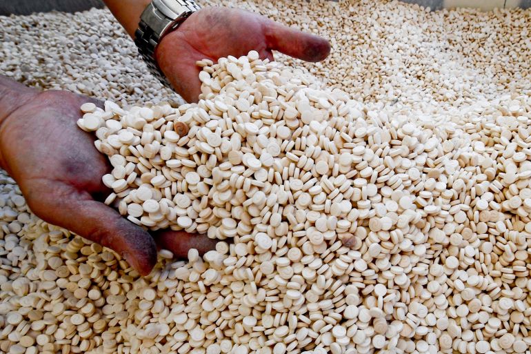 8979402-1718100220 epa08520844 Members of the Naples branch of the Italian Guardia di Finanza (GdF) law enforcement agency inspect a world record seizure of a 14-ton haul of amphetamines, in the form of around 84 million tablets bearing the 'captagon' symbol and reportedly produced in war-torn Syria by the so-called Islamic State (IS or ISIS) militant group, hidden in three containers found in the port of Salerno, just south of Naples, southern Italy, 01 July 2020. According to the police, the value of the drug, which was found in three suspected containers containing paper cylinders for industrial use and machinery arriving at the port of Salerno, has been estimated at over one billion euro. EPA-EFE/CIRO FUSCO