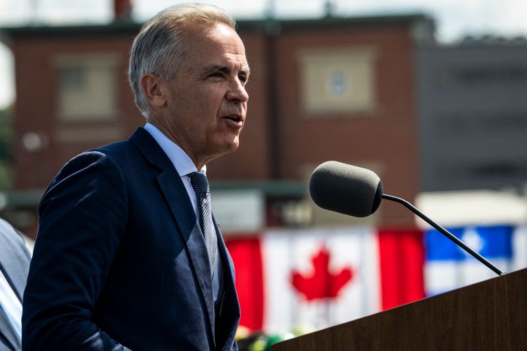 Canadian Prime Minister Mark Carney speaks about the trade dispute with the United States at the Davie Shipyard in Levis, Quebec, Canada on August 24, 2026.