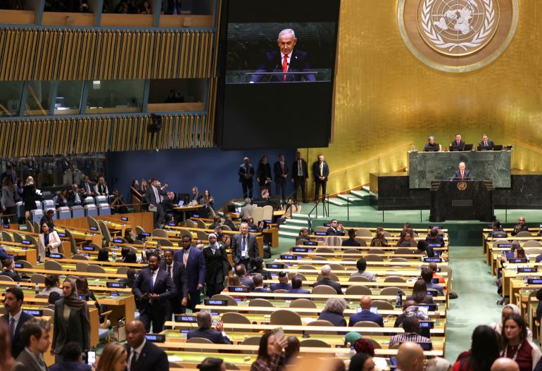 afp_6ab5716dd660-1790275949 Some attendees and delegation members walk out as Israel's Prime Minister Benjamin Netanyahu arrives to speak during the 81st United Nations General Assembly at the United Nations Headquarters in New York, on September 24, 2026. (Photo by TIMOTHY A. CLARY / AFP)