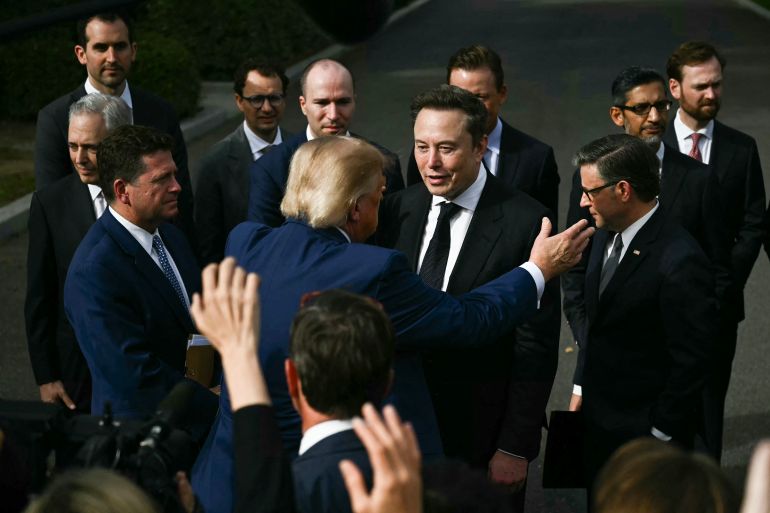 afp_6abc4e0dad73-1790725645 US President Donald Trump greets CEO of Tesla and SpaceX Elon Musk after a meeting with technology executives about artificial intelligence at the White House in Washington, DC, on September 29, 2026.