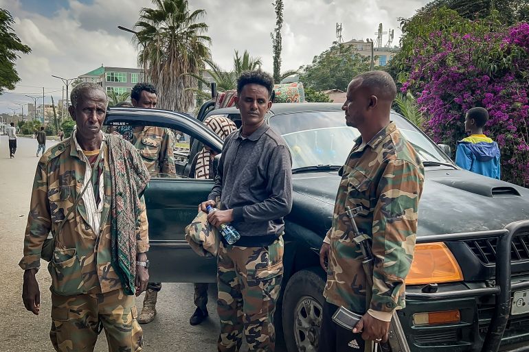 afp_6ac23d5e4250-1791114590 Members of the Ethiopian pro-government Tigray Peace Force (TPF) gather next to pickup truck as they patrol the streets while Ethiopian federal and allied forces enter the Tigray capital of Mekelle, on October 4, 2026.Ethiopian federal troops on October 3, 2026 entered the Tigray state capital Mekelle, which was largely abandoned by the region's rebel authorities, a humanitarian source told AFP."Ethiopian federal forces and allied forces have reportedly been observed in Mekelle city... across various locations," the source said, citing reports from staff on the ground. (Photo by AFP)