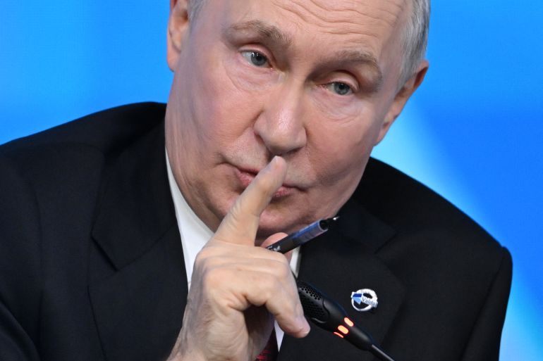 afp_6ac26bd6ec31-1791126486 Russia's President Vladimir Putin gestures as he addresses the audience during the Valdai Discussion Club meeting in Moscow on October 1, 2026. (Photo by Igor IVANKO / AFP)