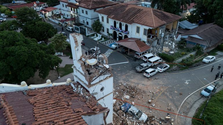 afp_6ac9834863c7-1791591240 This aerial view shows the collapsed Cathedral (L) and the collapsed Penonome Governor's Office building after a 7.6-magnitude earthquake struck the country, in Penonome, Panama, on October 9, 2026.