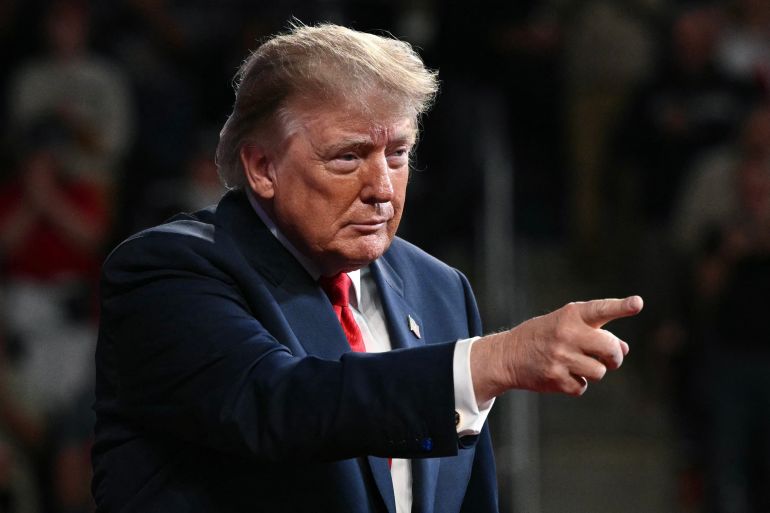 US President Donald Trump gestures after concluding his remarks during a campaign rally at F&M Bank Arena in Clarksville, Tennessee on October 10, 2026.