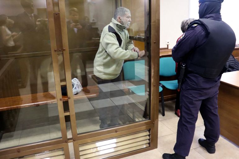 afp_6ad8d85a8e6b-1792596058 (FILES) In this grab from a handout footage taken and released by the Moscow City Court press service on October 7, 2024, US citizen Stephen Hubbard, 72, accused of fighting as a mercenary for Ukraine, attends his verdict hearing in Moscow.